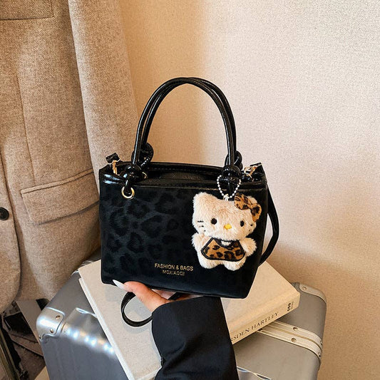 Daphne Wren Vintage-Inspired Shoulder Bag – Black with Charm