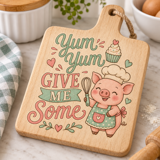 Yum Yum baking pig design mocked up on a mini wooden cutting board
